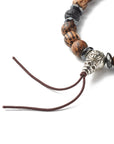 Bracciale in Ematite, Lava nera e legno - zucca con mantra incisi