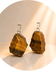 Pendant in the eye of raw tiger - energy and vitality