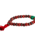 Bracciale in osso di Yak rosso decorato - Purezza, forza e coraggio