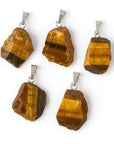 Pendant in the eye of raw tiger - energy and vitality