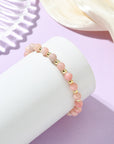 Bracciale Elastico in Opale Rosa Naturale ed Ematite Sintetica - equilibrio e forza interiore