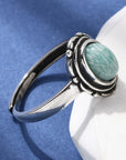 ANELLO OVALE IN AMAZZONITE in ottone – Calma e comunicazione