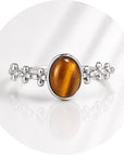 ANELLO FLOREALE CON OCCHIO DI TIGRE IN ARGENTO 925 - Forza e determinazione - Clorophilla Shop