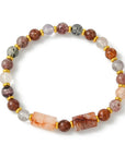 BRACCIALE SUPER SEVEN E QUARZO EMATOIDE – Spiritualità ed energia - Clorophilla Shop