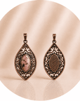 CIONDOLO OCCHIO IN RODONITE - Amore verso se stessi, equilibrio emotivo e perdono - Clorophilla Shop