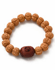 Bracciale in semi di rudraksha con fava ed incisione