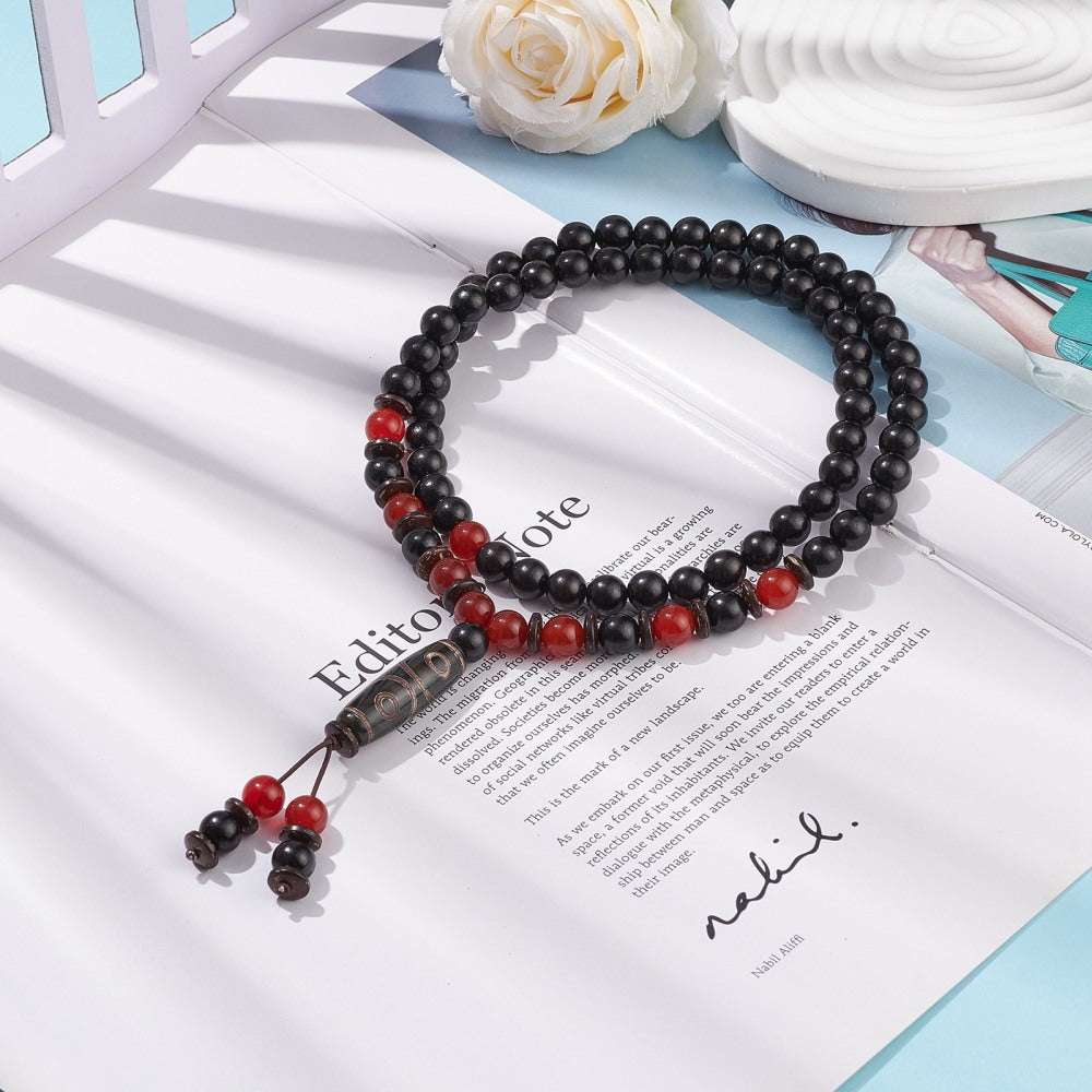 Collana Buddhista con ciondolo ovale in legno naturale e Agata rossa - clorophilla-shop