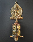 Table brass prayer wheel with historical Buddha Shakyamuni and Mantra Om - Tibetan Buddhist tradition - 17.5cm