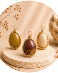 Mokiite pendant wrapped in golden copper wire - Stability, rooting and mental clarity