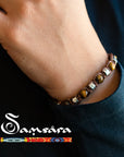 SAMSARA BRACCIALE TIBETANO IN OSSIDIANA NERA E ARGENTO 925 - Protezione, radicamento e forza interiore