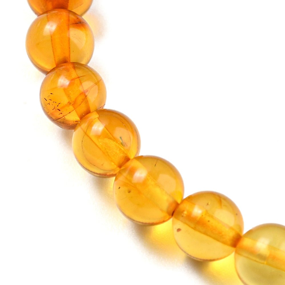 BRACCIALE IN AMBRA GRADIENTE ELASTICO - Energia e protezione - Clorophilla Shop