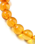 BRACCIALE IN AMBRA GRADIENTE ELASTICO - Energia e protezione - Clorophilla Shop